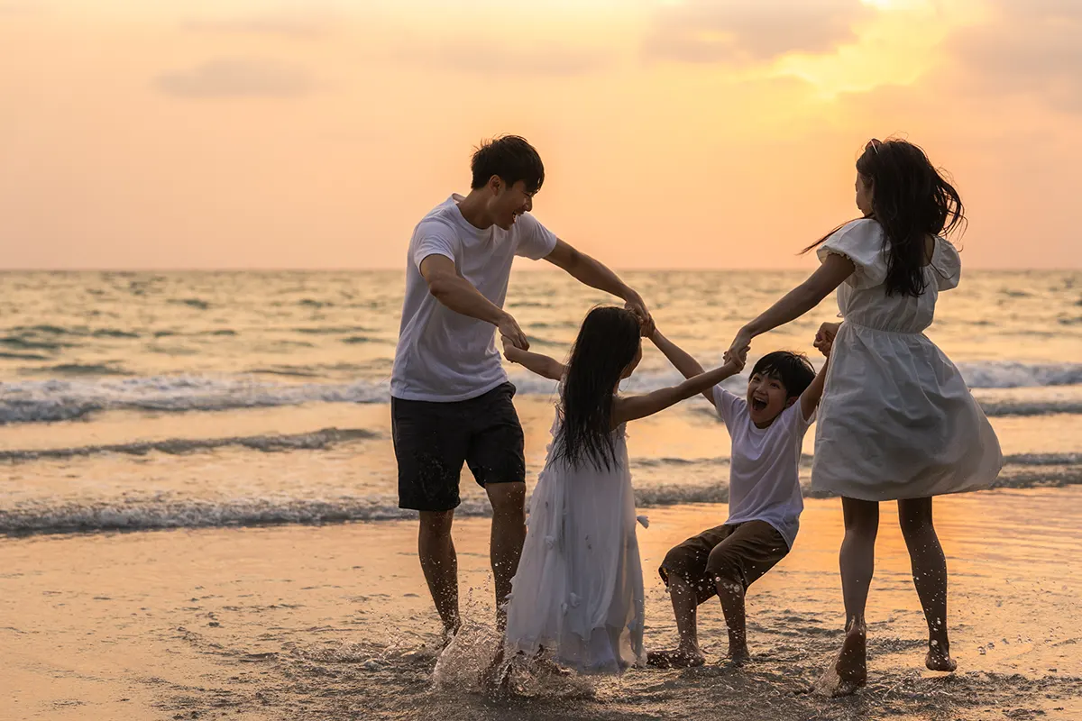asian young happy family enjoy vacation on beach i utc